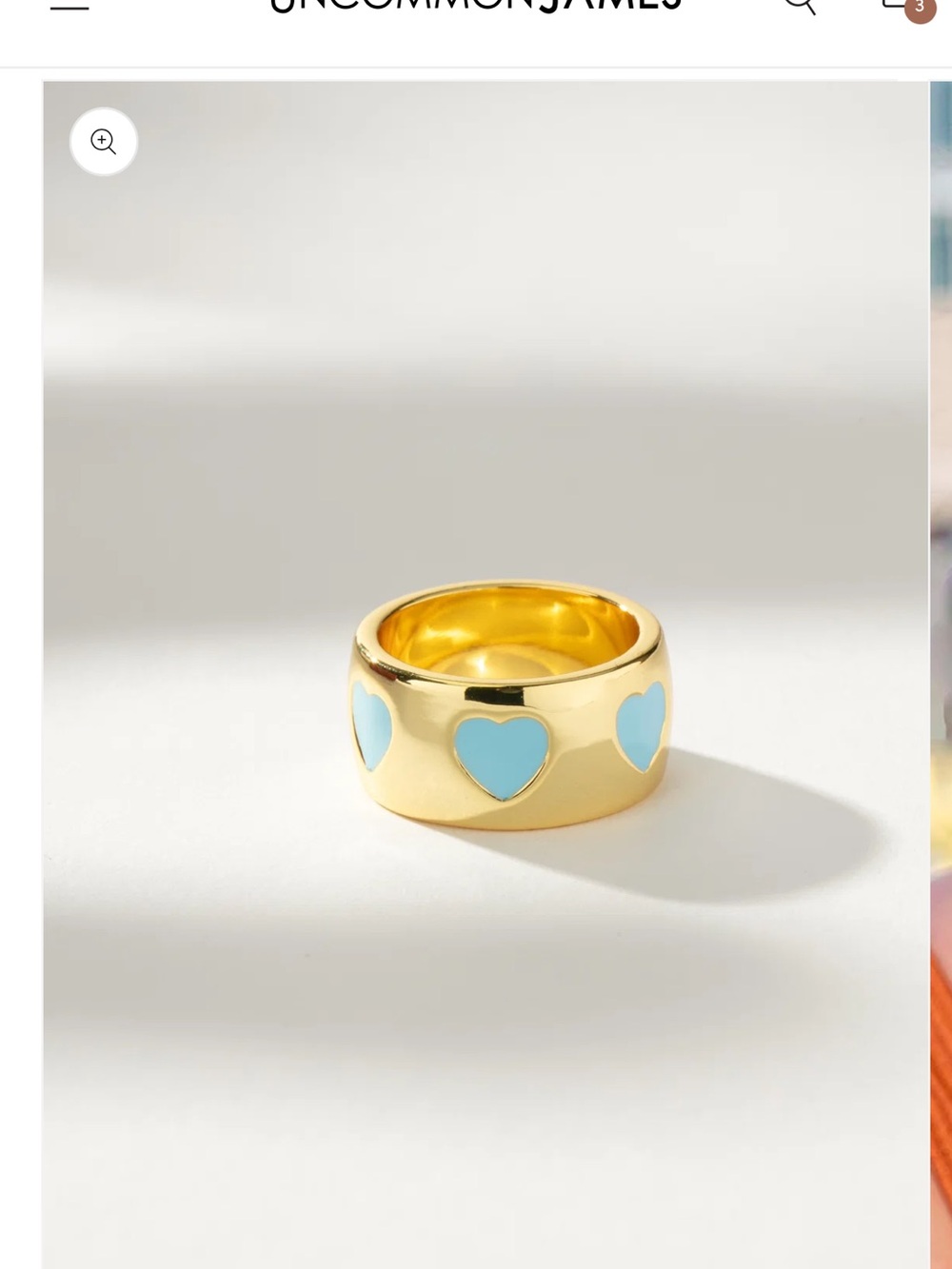 Uncommon James Gold Ring with Light Blue Heart Accents